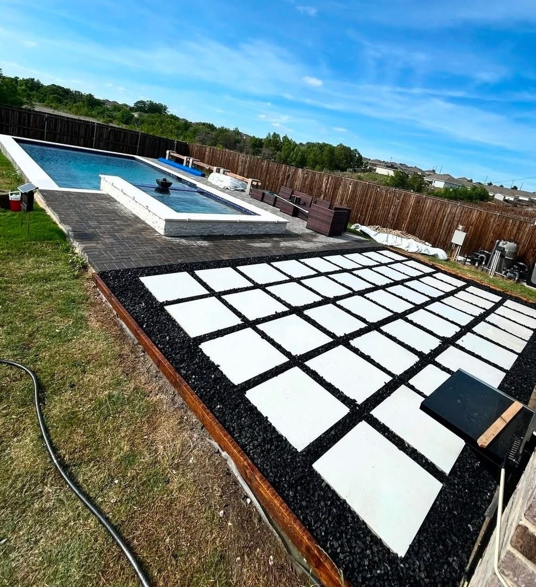 Pool-area paver patio — after Pro Turf Landscaping finished